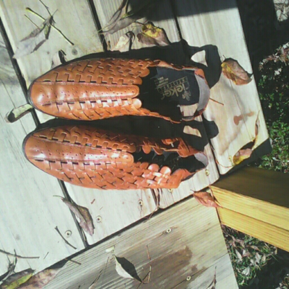 Tan leather shoes , open back