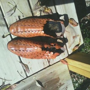 Tan leather shoes , open back