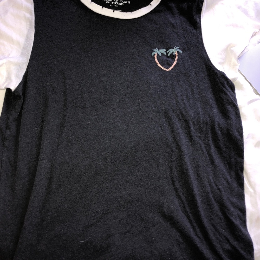 Tee shirt, grey with white sleeves, design on back