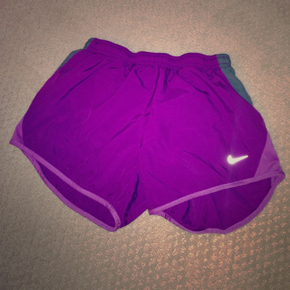 Purple Nike running shorts