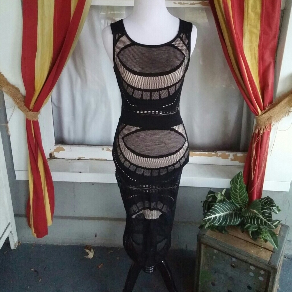 Privately privileged black netted dress