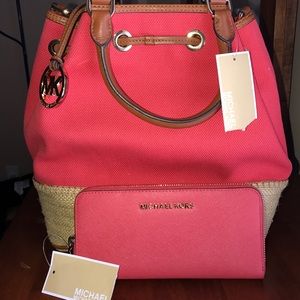 Brand new Micheal Kors handbag and wallet.