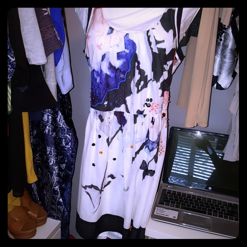 White and floralish design dress