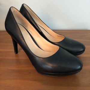 Black Cole Haan pumps.