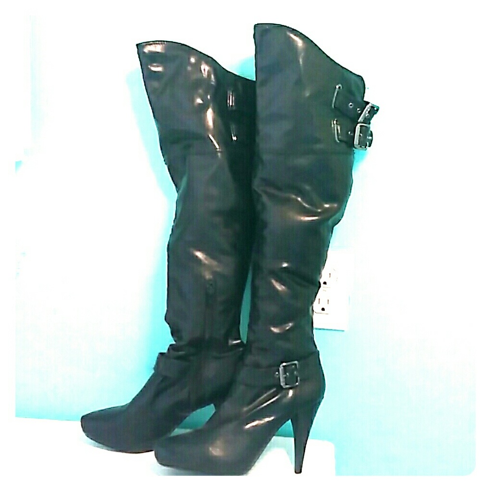 Knee length high heel boots