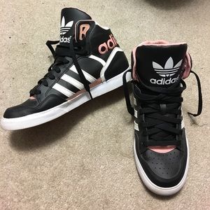 pink and white high top adidas