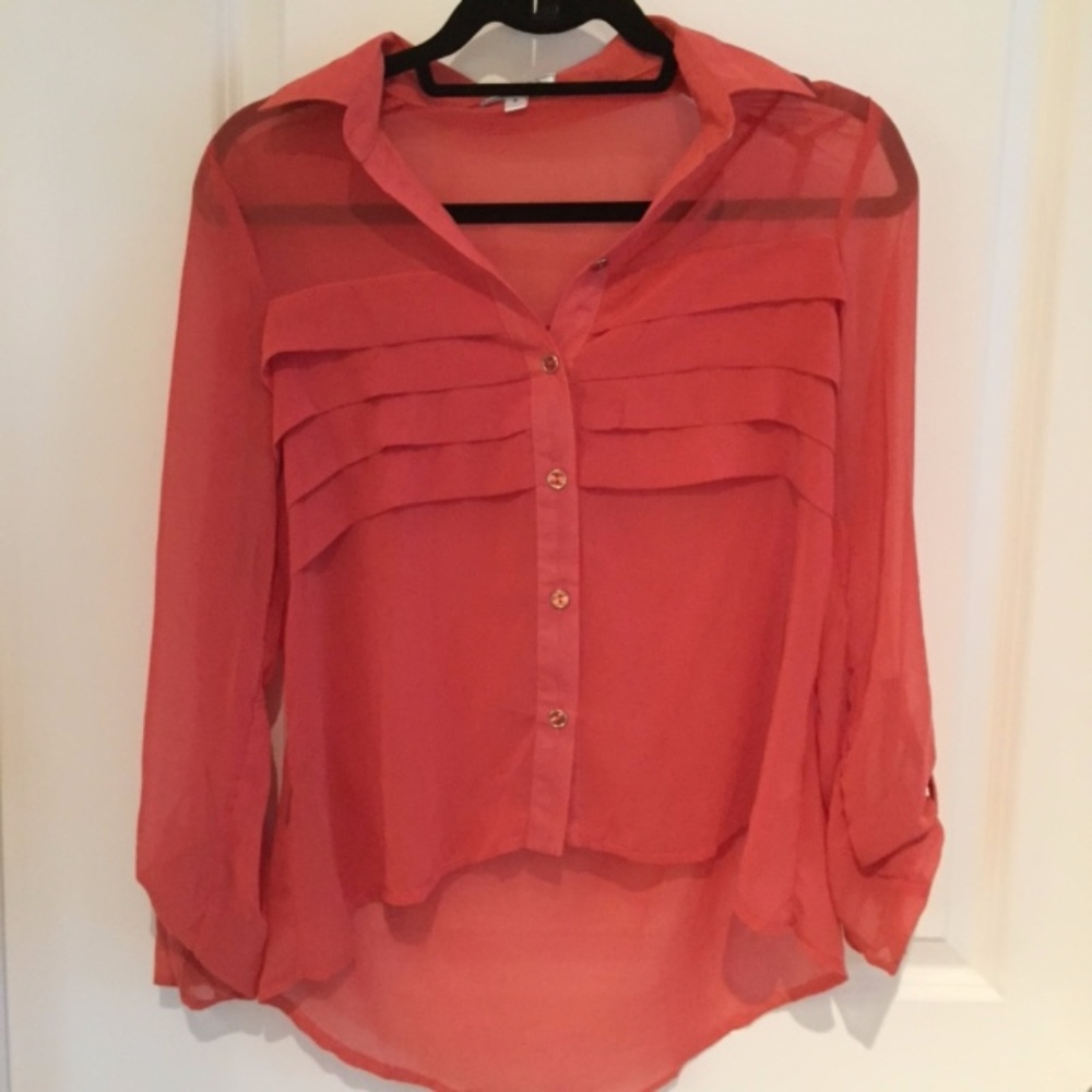 Salmon colored semi sheer dressy top size small