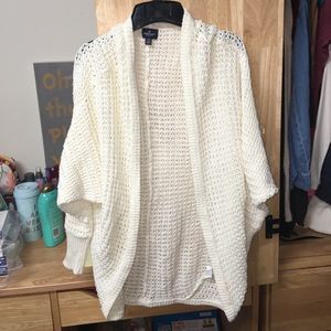 A cream sweater