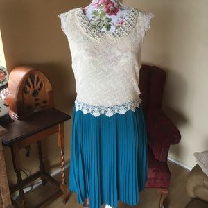 Vintage style dress with pearl accents.