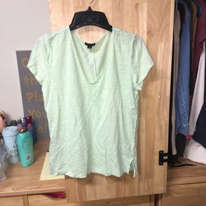 A lime green tee shirt