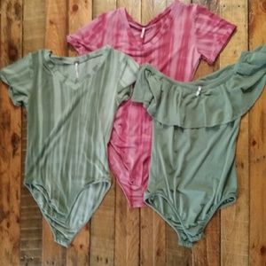 Bundle of 3 bodysuit's. 2 small. 1 medium