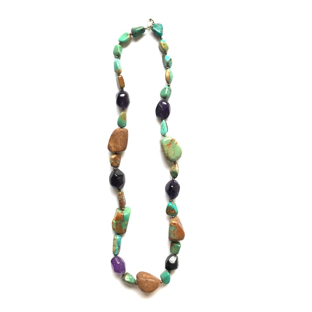 Real turquoise and purple stone necklace.