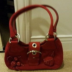 Red suede Prada purse