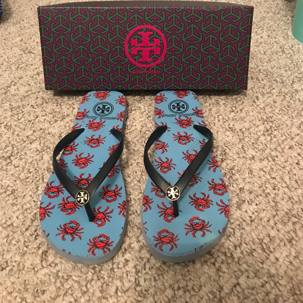 Lightly used crab flip flops