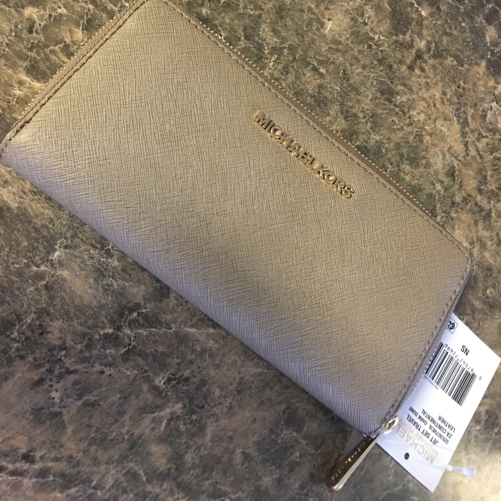 MK Women's Jet Set Travel Continental Wallet