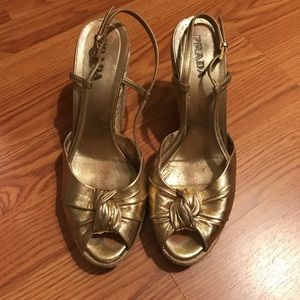 Gold knotted Prada wedges