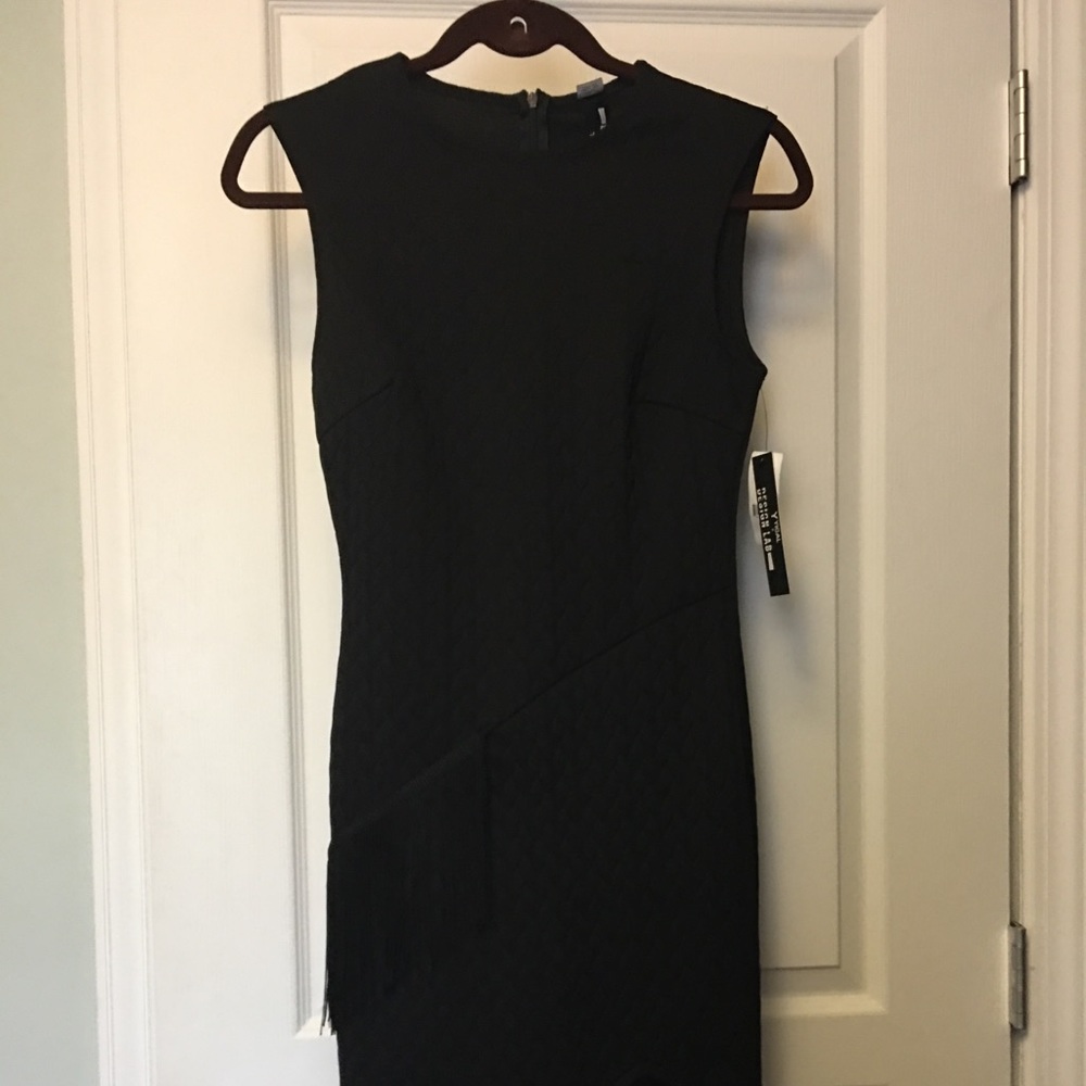 Brand new black dress with fringe. Size 2