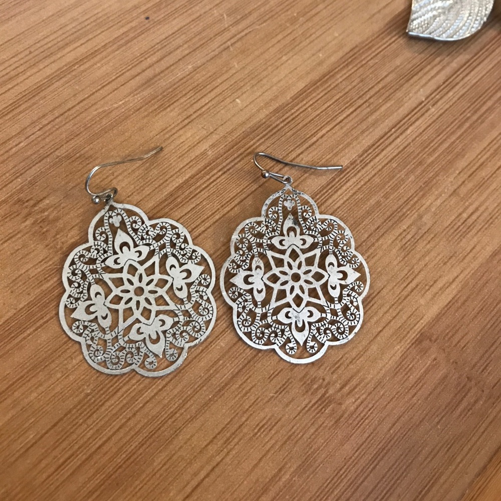 Silver colored dangly earrings