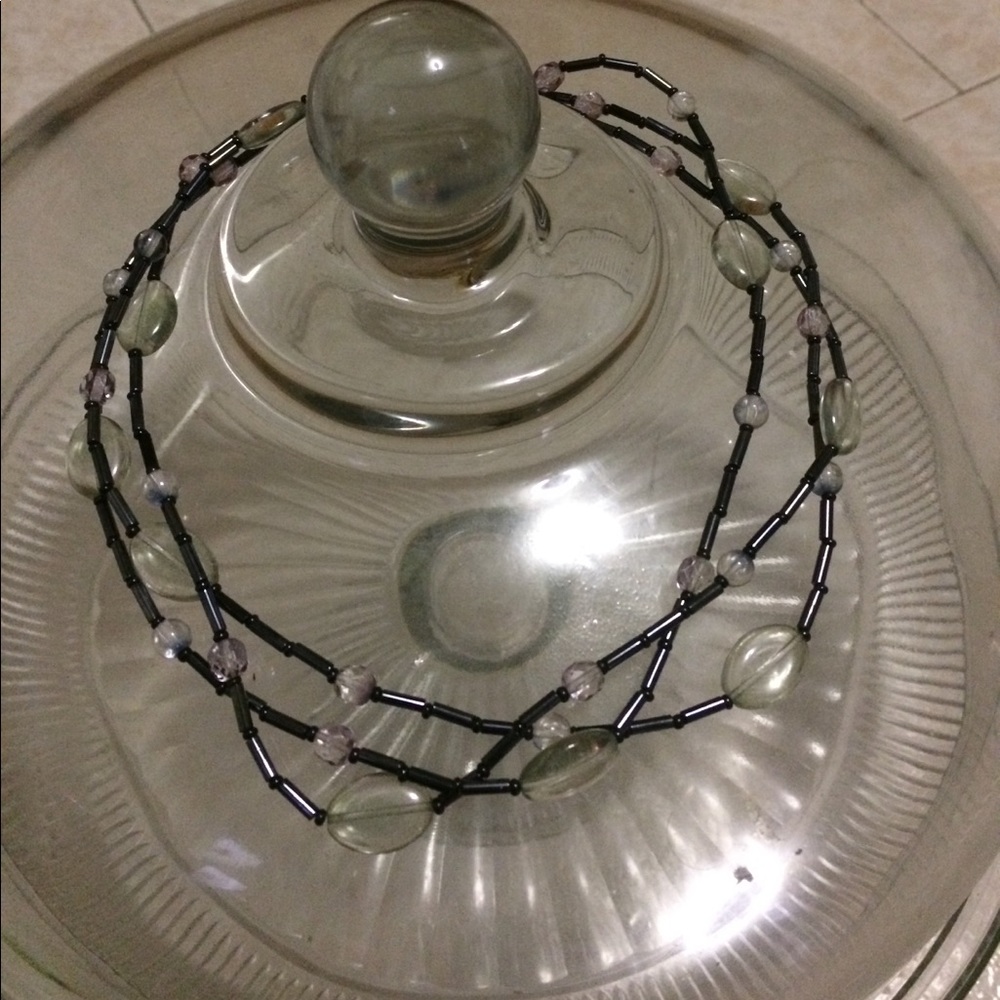 Clear and greyish black Beaded necklace.