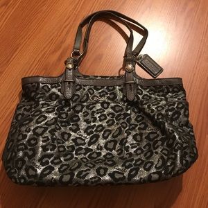 Metallic coach ocelot purse
