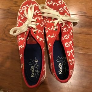 red with white bows. Taylor swift Keds.