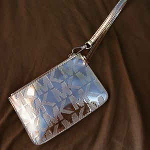 Michael Kors Rose Gold wristlet 🌹