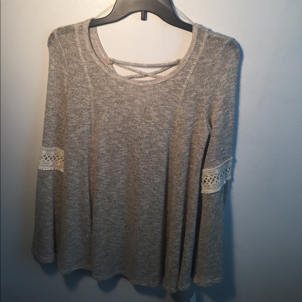 long sleeve with cross back and fancy sleeve