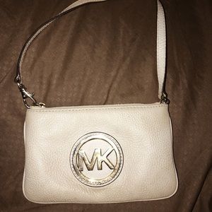 Cream colored Micheal Kors Wristlet 💫