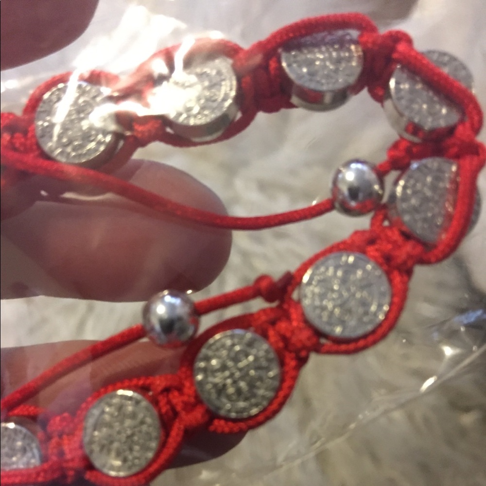 Red saint bracelets