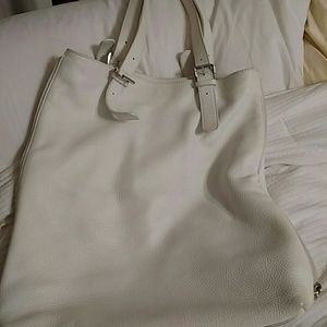 Pretty white purse...side zipper opens to red