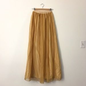 Floor-length yellow skirt
