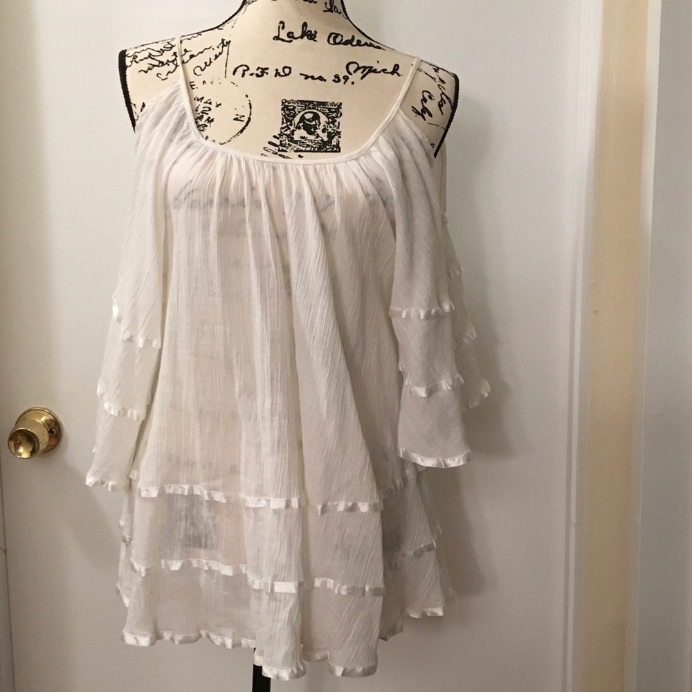 White cold shoulder top.