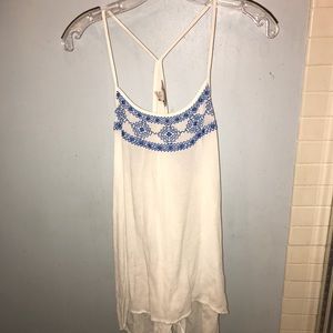 White and with blue design tank