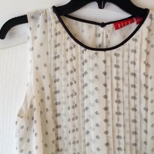 Blouse with leather trim detail