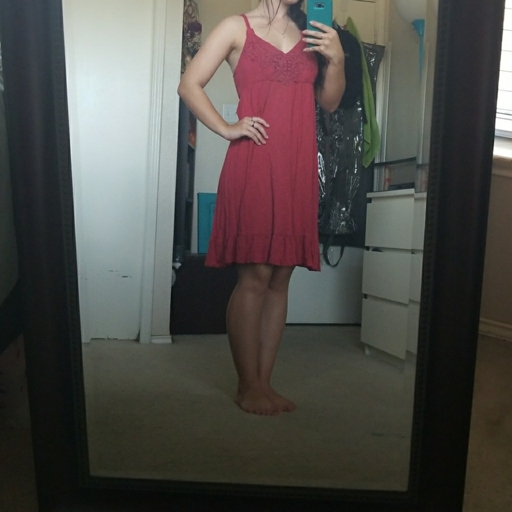 Red spaghetti strap dress.