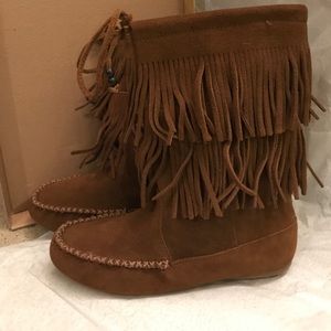 Women’s Minnetonka Boot.