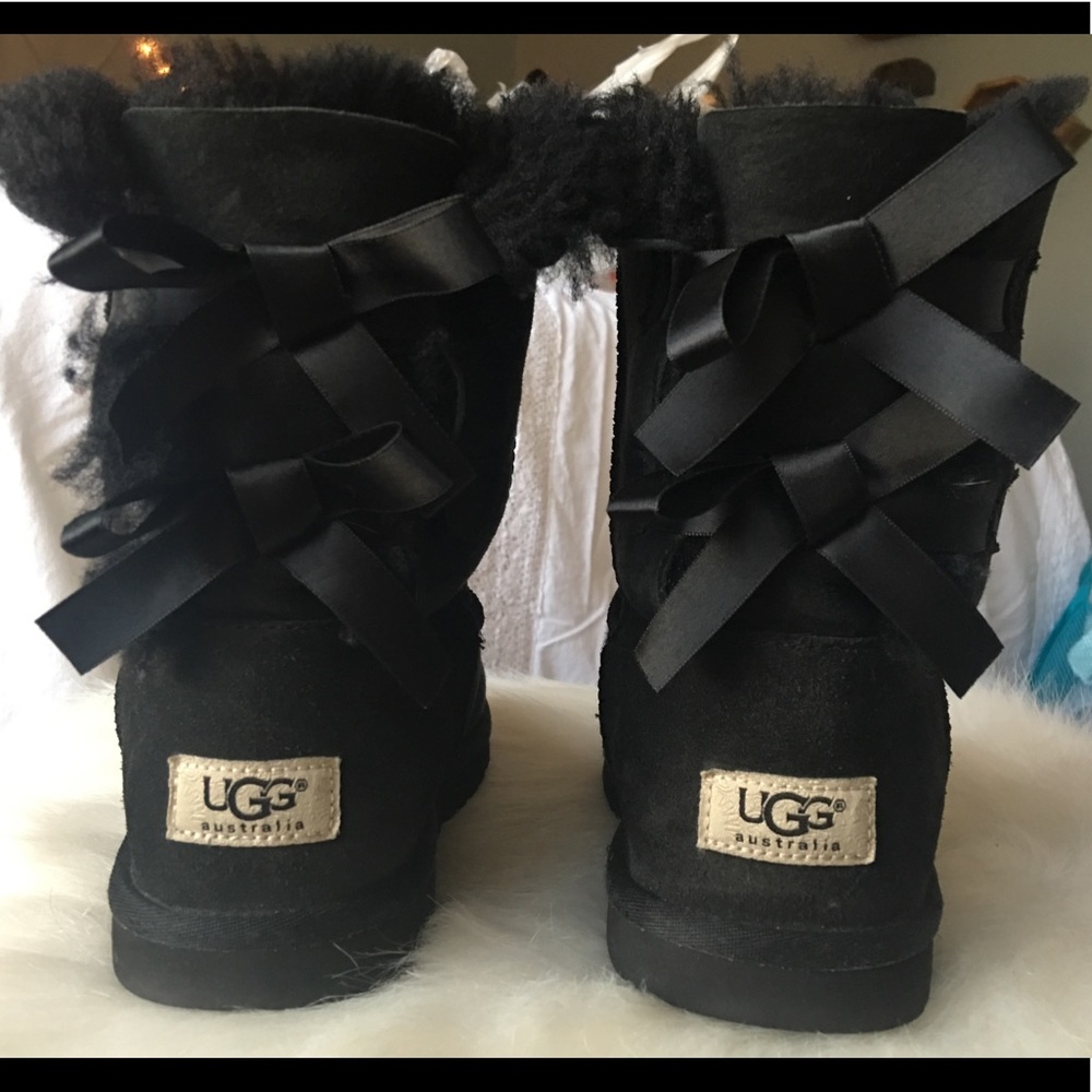 Black bowed Ugg boots