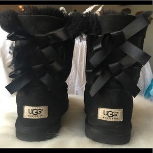 Black bowed Ugg boots
