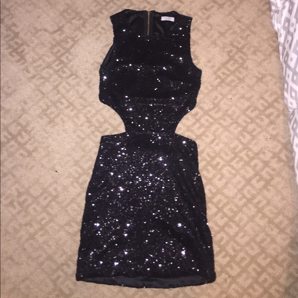 Cute black mini dress for a special occasion.