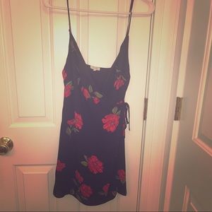 Little black wrap/tie dress with red flowers
