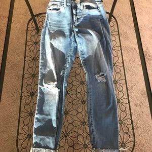 High waisted torn skinny jeans