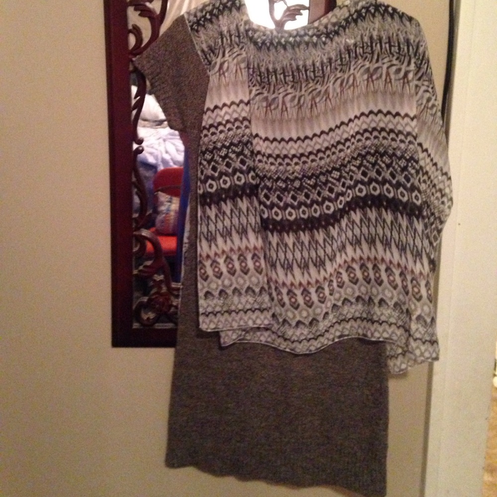 A multi colored almost sheer beautiful poncho