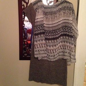 A multi colored almost sheer beautiful poncho