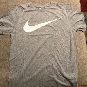 Grey Nike T with whitish/grey swoosh. Size M