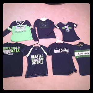 Lot of Seahawks t-shirts!!