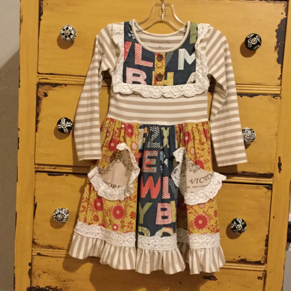 Long sleeved multi printed dress