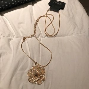 Gold and charming necklace