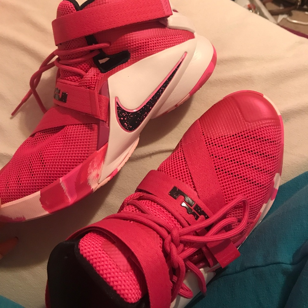 Pink and white nike sneakers