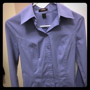 Women’s purple button up top.