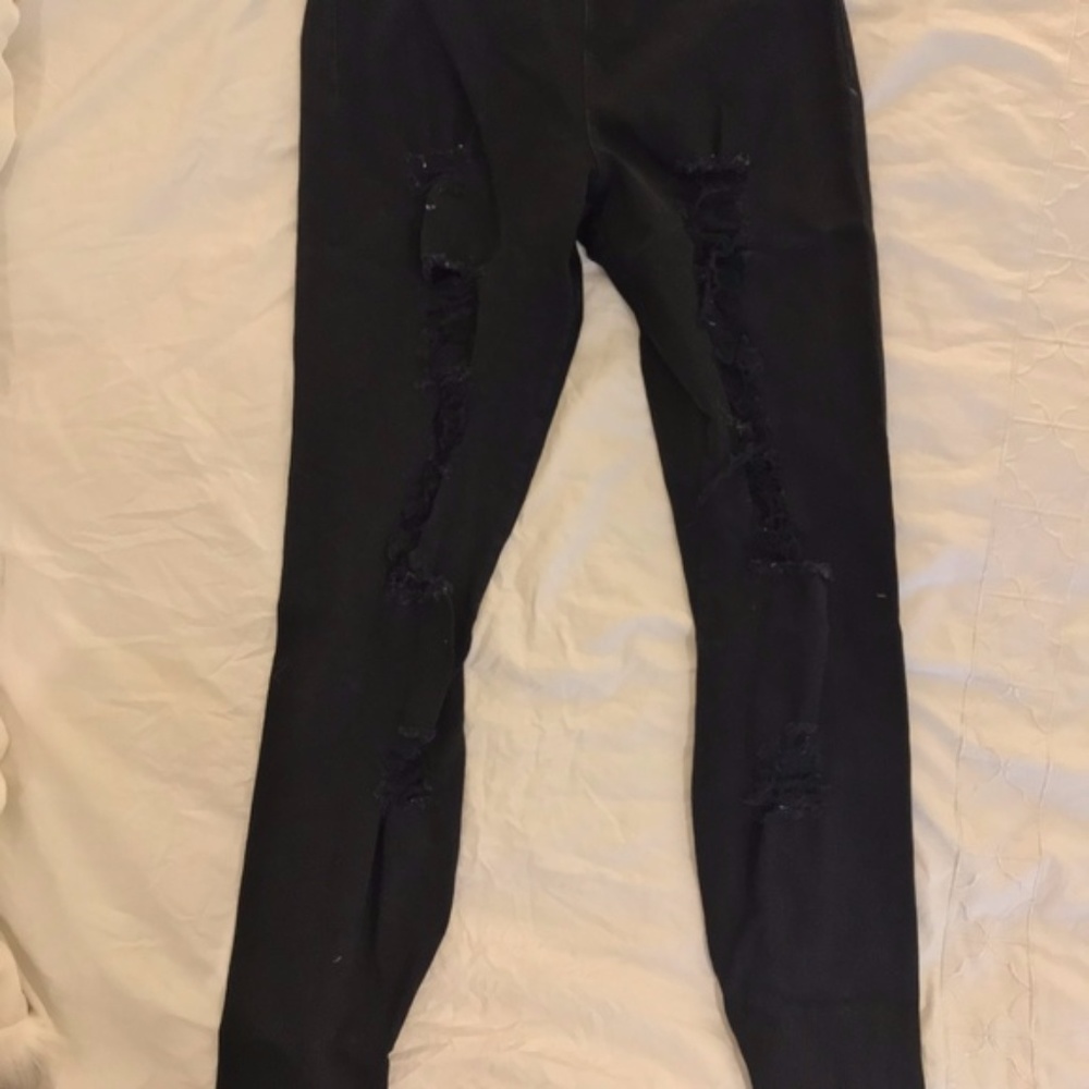Joe's jeans w/ tears on front, zips on bottom